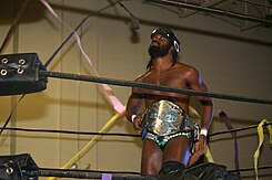 Swann is a former X Division Champion. Rich Swann Impact X Division Champion.jpg
