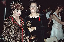 Metcalf and Rosie O'Donnell holding an Emmy