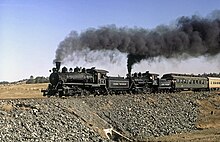 Sierra Railroad excursion train starts upgrade out of Chinese Camp, September 1971 SRR 34 and 28 Chinese Hill Sept 71xRP - Flickr - drewj1946.jpg