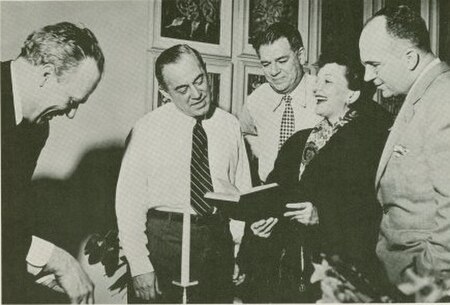 The creative team and star of South Pacific, L–R: Joshua Logan, Richard Rodgers, Oscar Hammerstein II, Mary Martin, and Michener (1949)