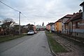 Čeština: Jižní pohled do ulice Dr. E. Beneše v Okříškách, okr. Třebíč. English: South view of Dr. E. Beneše street in Okříšky, Třebíč District.