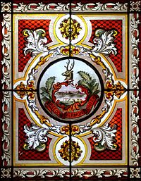 The state coat-of-arms is illustrated in one of two stained glass skylights In the Cedar Creek Room, a reception room in the west wing. Stained glass skylight in the Cedar Creek Room in the Vermont State House.jpg