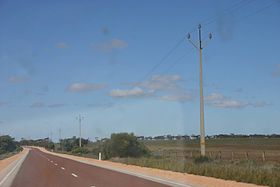 Stobie poles beside Flinders Highway.jpg