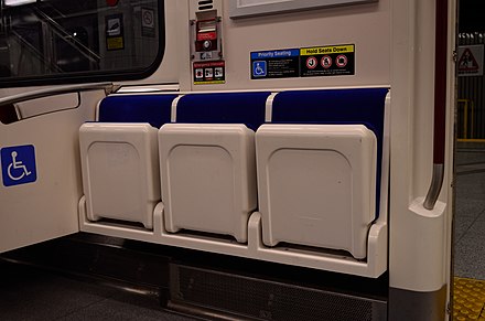 The accessible area on a Toronto Rocket subway train feature automatic folding seats.