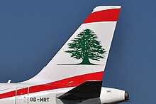 Stylized flag of Lebanon on Middle East Airlines Airbus A320 tail Tail of MEA airbus.JPG