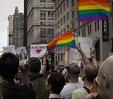 People at the 2008 gay marriage rally, including a protester who's sign says "THE GAY AGENDA: 1. Equality 2. See Item 1" The Gay Agenda (3048463237).jpg