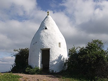 Trullo: a traditional Apulian stone dwelling with a conical roof