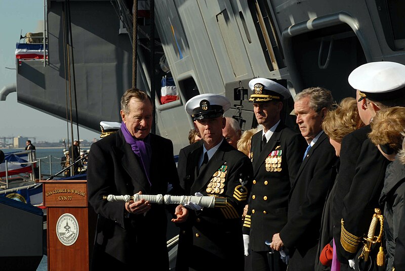 File:US Navy 090110-N-5735P-239 Command Master Chief Jon Port passes the.jpg