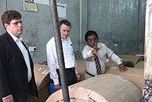 Chris Murphy and another official from the US Senate Foreign Relations Committee inspecting burnt down printing press of Uthayan newspaper in Jaffna on December 7, 2013, while E. Saravanapavan, the managing director of the newspaper explaining something to him. US Senate Foreign Relations Committee Inspecting Burnt Down Printing Press of Uthayan Newspaper.jpg