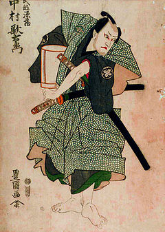 Utaemon Nakamura III sebagai kuil takebe Genzō.jpg