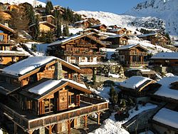 Snow-covered cottages in Verbier