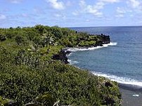 Black sand beach at Wainapanapa, in Maui. Phot...