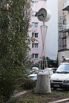 Clock tower and base "Fire brigade through the ages"