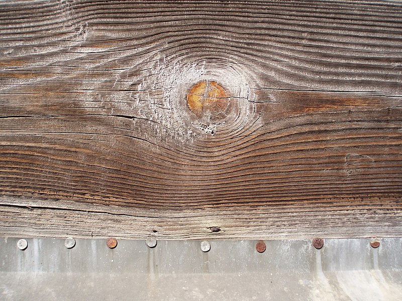 File:Wooden-plank-and-nailed-alum-sheet.jpg