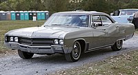 1967 Buick Wildcat 4-door Hardtop Sedan, front left (Hershey 2019).jpg