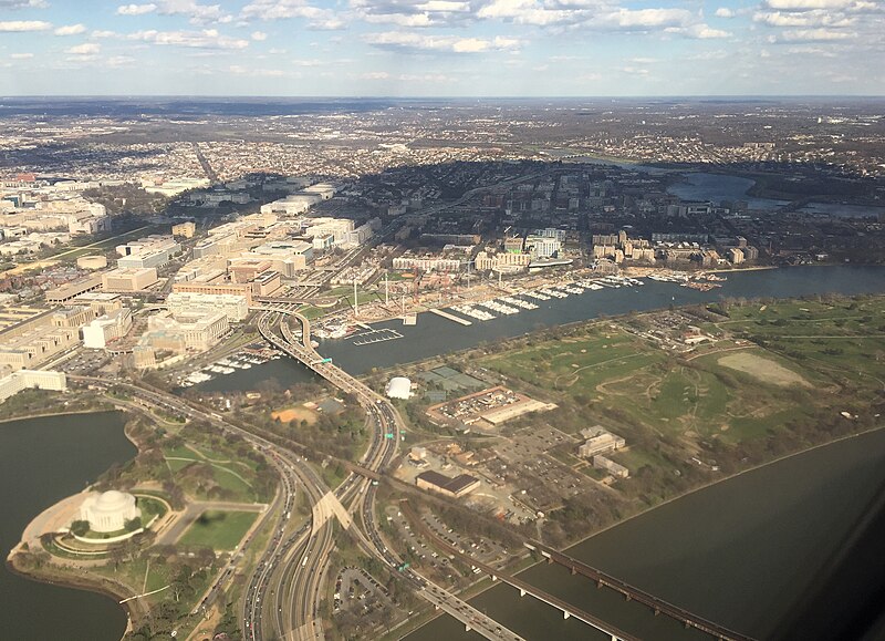 File:2016-03-18 16 41 22 View of Washington, DC from an airplane departing Ronald Reagan Washington National Airport, with the Washington Channel and Southwest Waterfront at the center.jpg