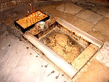 Ascension Rock, inside the Chapel of the Ascension (Jerusalem), is said to bear the imprint of Jesus' right foot as he left Earth and ascended into heaven. 5029-20080122-jerusalem-mt-olives-ascension-rock.jpg