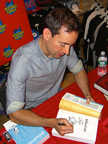 Craig Thompson sketches Raina in a copy of the book at a September 20, 2011, book signing at Midtown Comics in Manhattan. 9.20.11CraigThompsonByLuigiNovi22.jpg