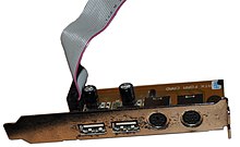 An ATX Form Card, used by later Baby-AT motherboards to allow for USB, PS/2 mouse, and IR connectivity through headers ATX Form Card.jpg