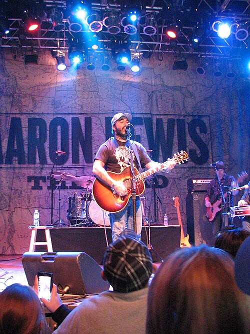 Lewis performing at the House of Blues in Cleveland in 2013