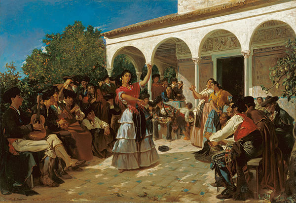 A Gypsy dance in the gardens of the Alcázar of Seville.