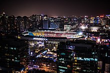 Beijing Workers' Stadium at night as viewed from Sanlitun Beijing Workers' Stadium.jpg