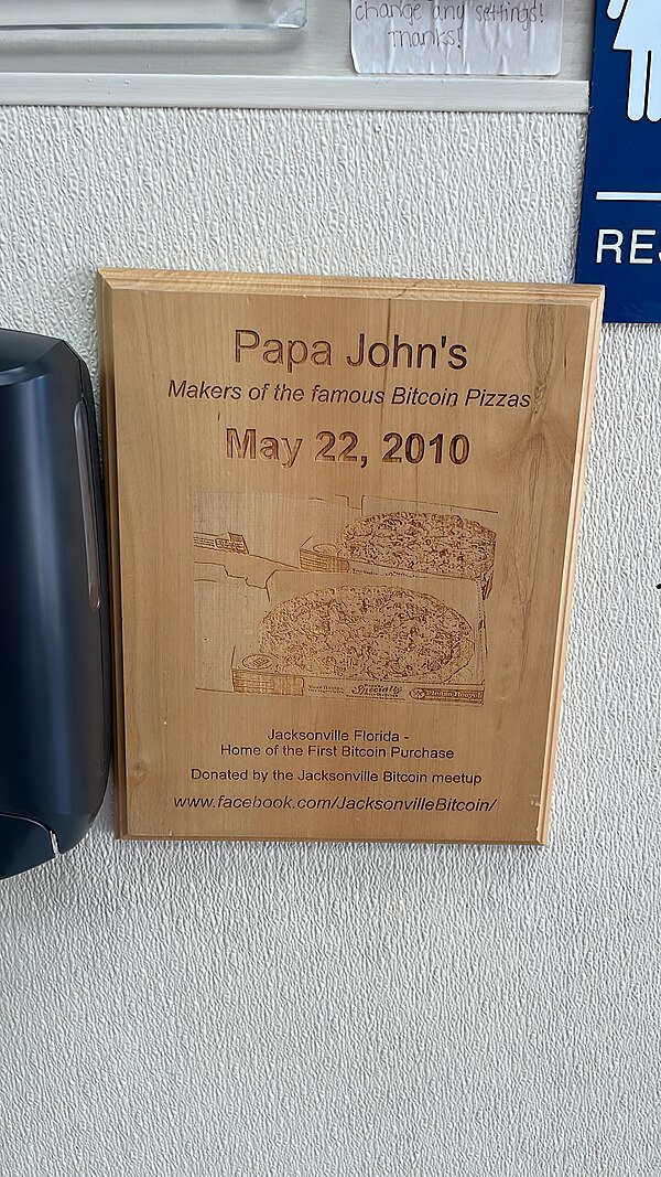 The plaque at the Papa John's franchise on Atlantic Blvd in Jacksonville, Florida, where two pizzas were made and delivered from for the first notable