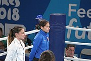 Deutsch: Boxen bei den Olympischen Jugendspielen 2018 Tag 12, 18. Oktober 2018 - Medaillenzeremonie im Fliegengewicht der Mädchen - Gold: Martina La Piana (Italien), Silber: Adijat Gbadamosi (Nigeria), Bronze: Heaven Destiny Garcia (USA); Medaillenübergabe durch Habu Gumel (IOC, Nigeria), Geschenkübergabe durch Dr. Joseph O. Ayeni (Nigeria, AIBA). English: Boxing at the 2018 Summer Youth Olympics on 18 October 2018 – Girl's flyweight Medal Ceremony - Gold: Martina La Piana (Italy), Silver: Adijat Gbadamosi (Nigeria), Bronze: Heaven Destiny Garcia (USA); Medal handover by Habu Gumel (IOC, Nigeria), Gift presented by Dr. Joseph O. Ayeni (Nigeria, AIBA). Español: Boxeo en los Juegos Olímpicos Juveniles de Verano de 2018 en 18 de octubre de 2018 - Ceremonia de la Medalla de peso mosca para niñas - Oro: Martina La Piana (Italia), Plata: Adijat Gbadamosi (Nigeria), Bronce: Heaven Destiny Garcia (Estados Unidos); Entrega de medallas por Habu Gumel (COI, Nigeria), Regalo presentado por Joseph O. Ayeni (Nigeria, AIBA).