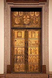 Bronzinės universiteto bibliotekos durys, skirtos pirmos lietuviškos knygos 450 metų jubiliejui