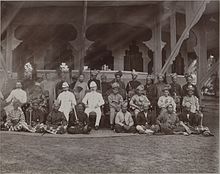 Negeri Sembilan chieftains seated (middle row) with Tuanku Muhammad Shah (second from left), 1903. CO 1069-491-09 (7888096290) 01.jpg