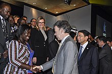 Colombian President Manuel Santos Calderon in a chat with Tourism Minister Mrs Elizabeth Ofosu-Adjare while UNWTO Secretary General Dr Taleb Rifai looks on at the opening of the 21st seeion.jpg