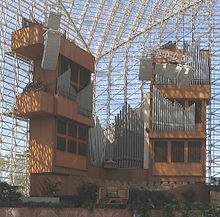 The multi-level organ pipework, with the Cathedral's glass walls in the background