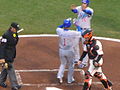 The Cubs score during an away game against the San Francisco Giants, winning 8-6.