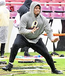 Flowers warming up before a game with the Washington Redskins, 2019 Ereck Flowers (cropped).jpg