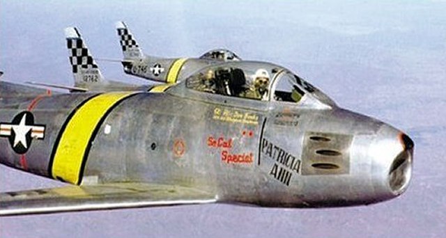 North American F-86E-10-NA Sabres of the 25th Fighter-Interceptor Squadron (51st) FBG over Korea. Identifiable is serial is 51–2742.