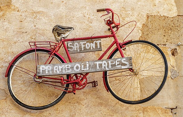 Bicycle as a sign for a pancake restaurant in Santanyí