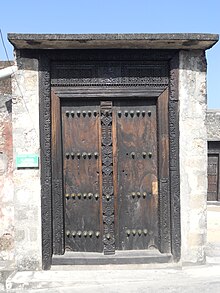 Swahili Arabic script on wooden door in Fort Jesus, Mombasa in Kenya Fortjesusdoor.JPG