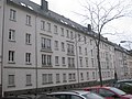 Three residential buildings in closed development, designed as a single row of residential buildings