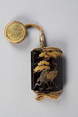 Inro with a design of cranes standing beneath a gnarled pine tree and netsuke depicting Minamoto no Yoshitsune and Benkei, Edo period, 18th century
