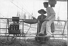 Mars aboard dirigible looked on by his wife J.C. Mars, pilot of the dirigible balloon, and his wife just before takeoff (3382412657).jpg