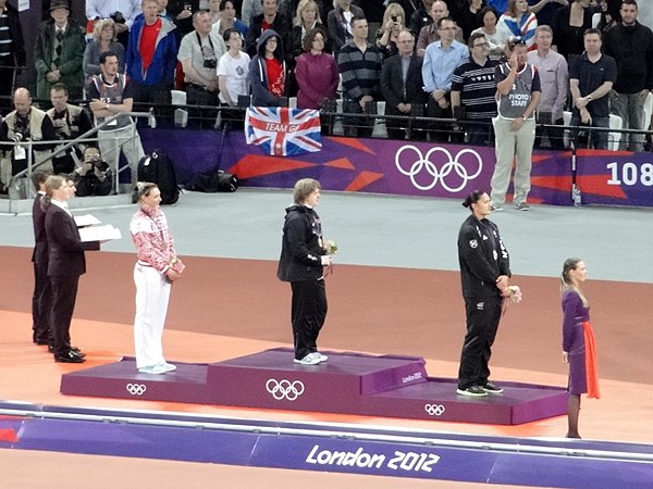 Shot put medal ceremony (l-r) Yevgeniya Kolodko, Nadzeya Ostapchuk, Valerie Adams