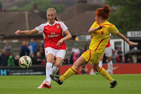 England women's captain Leah Williamson (left) defends for Arsenal.