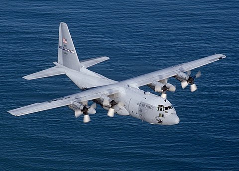 A U.S. Air Force Lockheed C-130 Hercules, the archetypal military transport aircraft, over the Atlantic Ocean in 2014