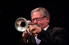 Mike Williams playing his trumpet. Michael P. Williams playing his trumpet..webp