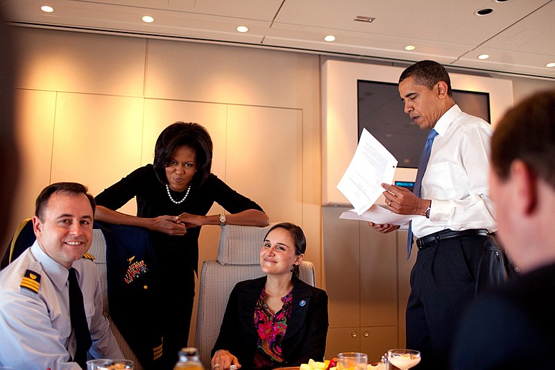 File:Michelle and Barack Obama with staff in Air Force One.jpg