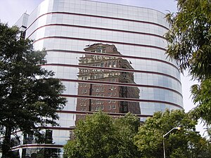 In Midtown, the windows of a 1990s-era post-modern structure reflect a classical-style building Midtown Reflection Atlanta.jpg