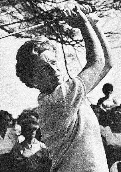 File:Miss Smith follows the flight of her ball after driving up the fairway gisborne photo news.jpg