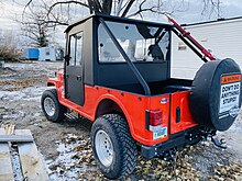 Rear view Red 2018 Mahindra Roxor with after market hard cab 09 24 34 075000.jpeg