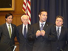 Martin (mid-right) in Congress, with Luis Fortuño (far left), Tom Lantos (mid-left) and Chris Smith (far right).