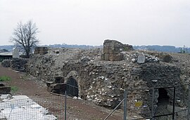 Roman ruins: a vaguely rectangular platform on which fragments of a stone-block structure can be seen